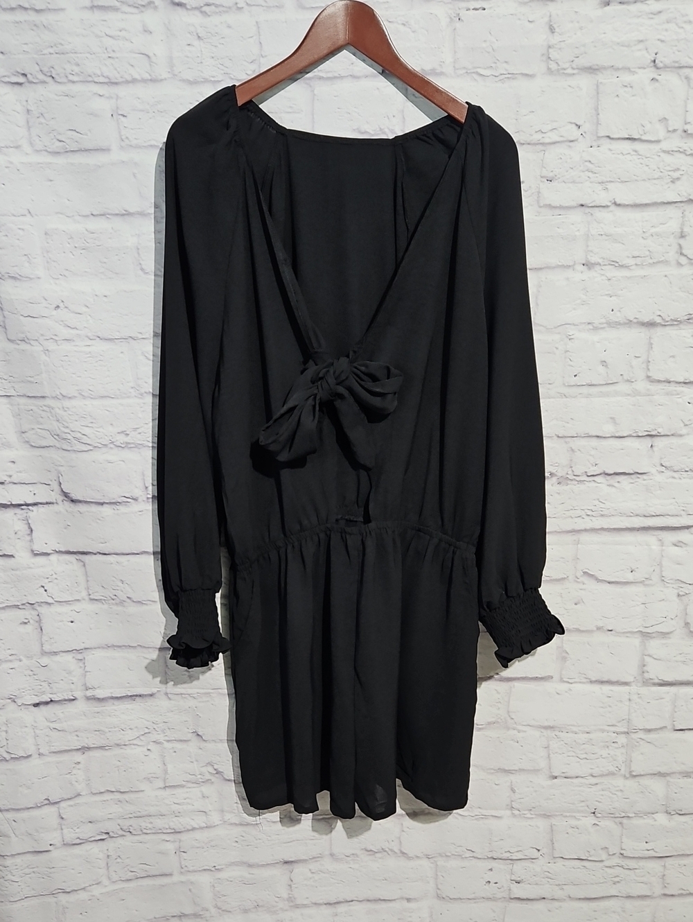Black Long-Sleeve V-Neck Romper with Bow Tie Front